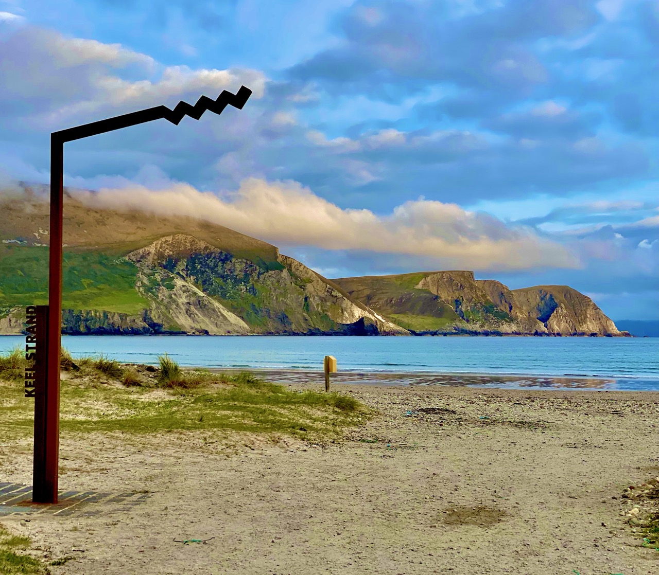 Keel Strand sign overlooking beach and cliffs on Achill Island