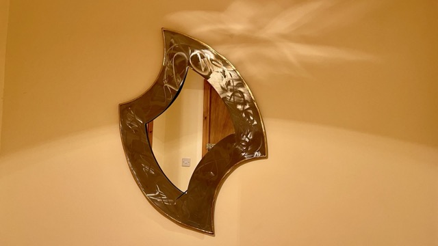 Decorative wall mirror detail inside the apartment