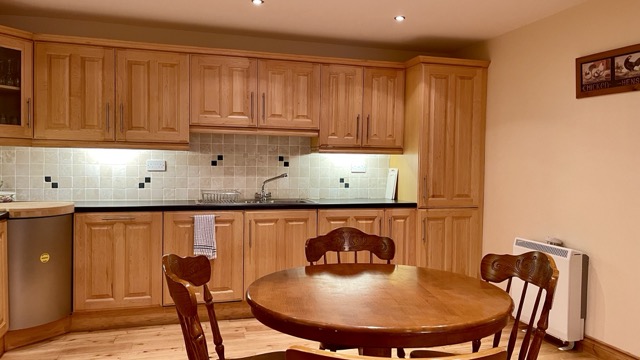 Apartment kitchen with round dining table
